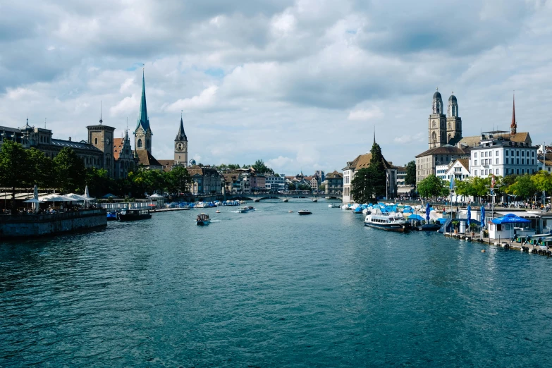 there are many boats moving down the river