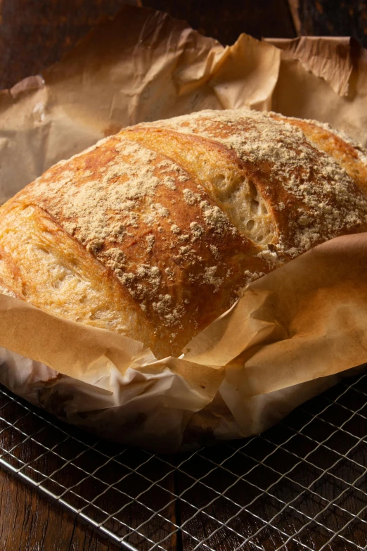 bread on a wire rack, on top of the paper