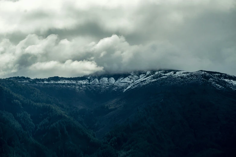 mountains that are covered with snow during the day