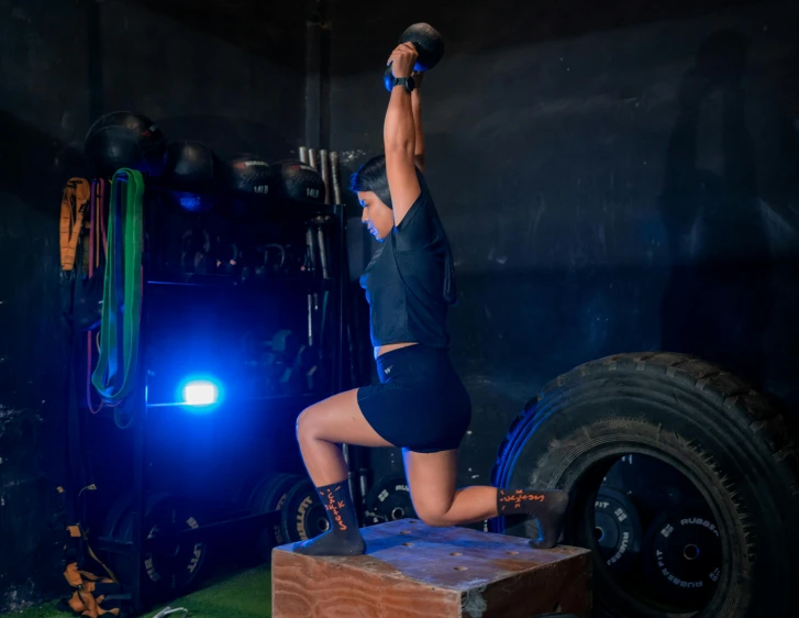 the woman does the jump on the platform