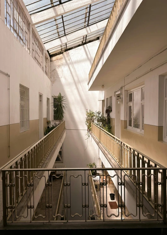 a long narrow alley in an indoor building