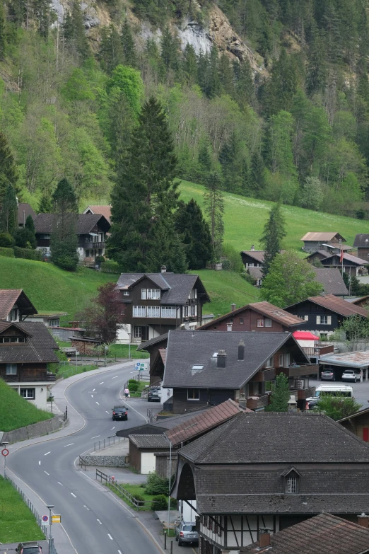 a city with trees on the mountainside