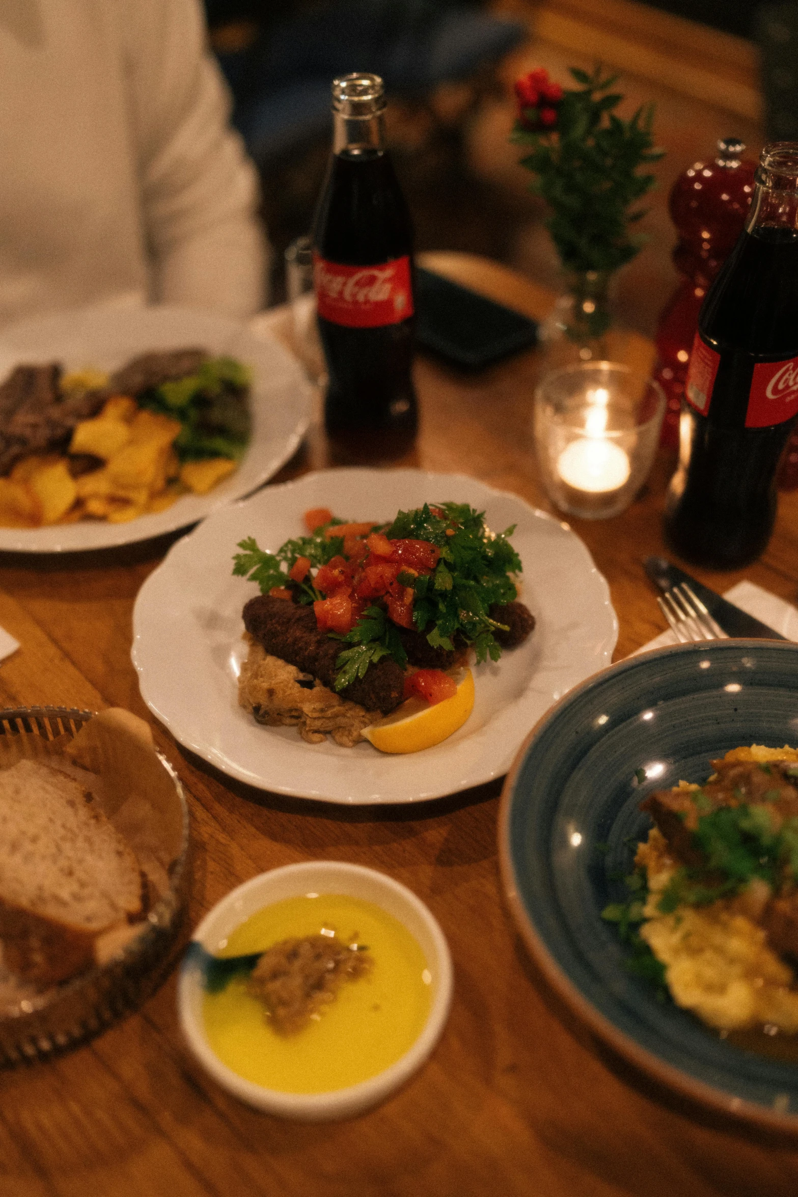 two plates on the table have food and drink