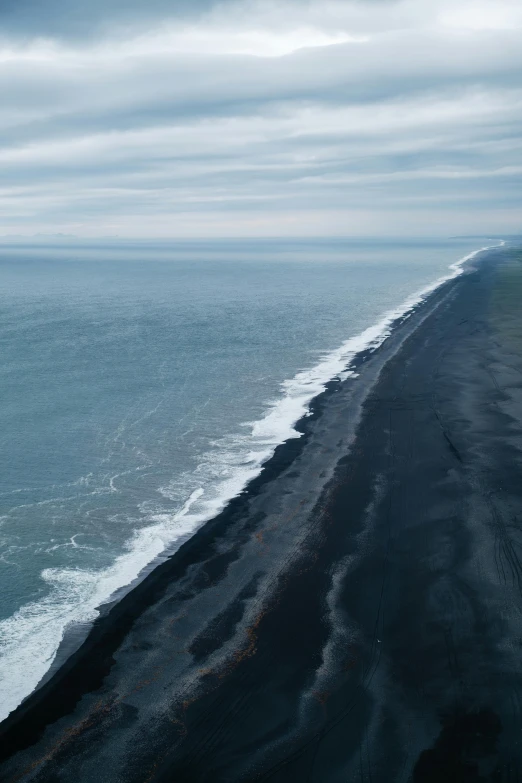 an ocean view of the coastline from above