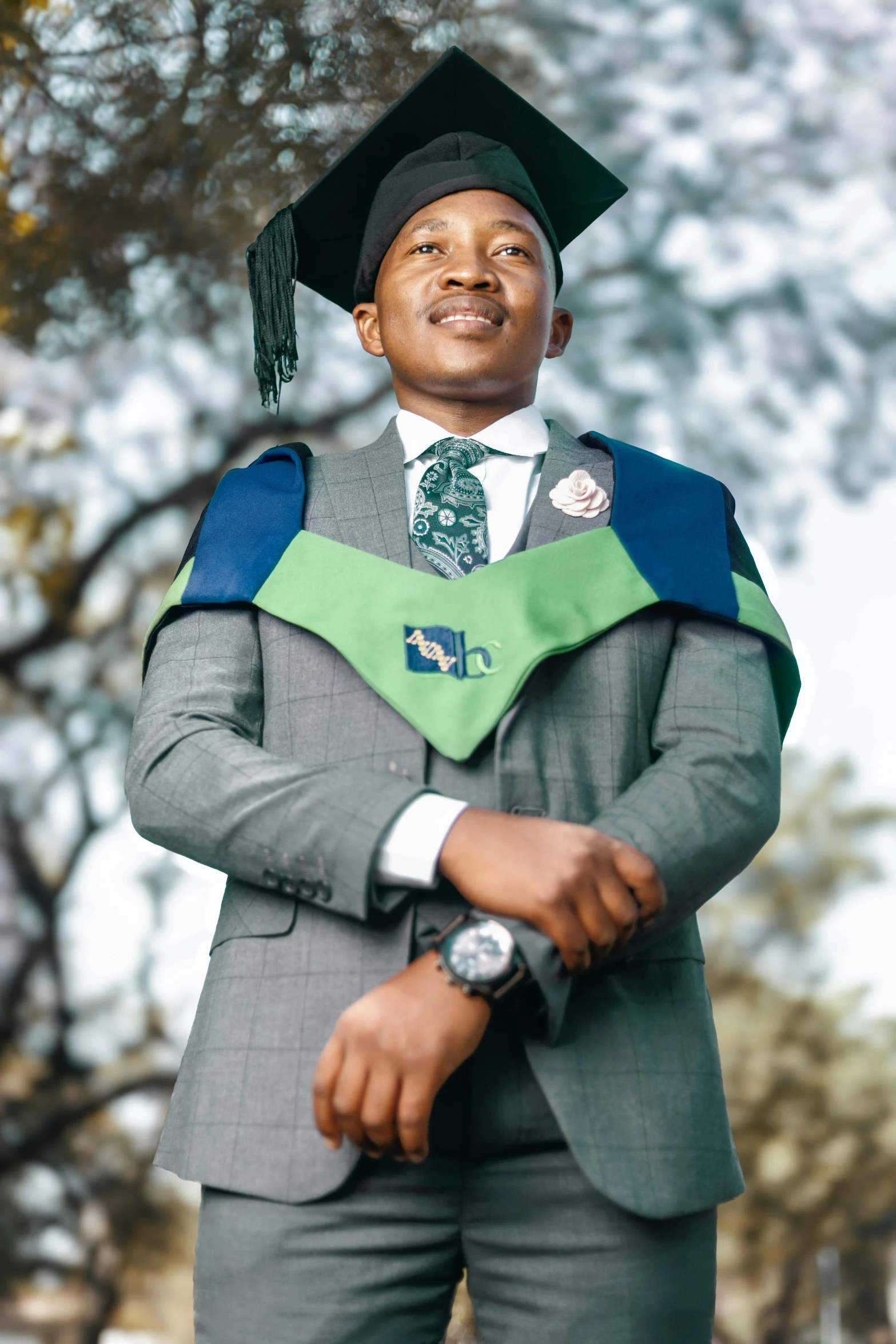 a man in a graduate's cap and gown