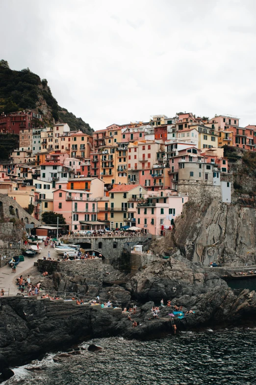 a small village sits high on the side of a hill