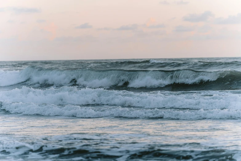 a surfer riding the waves in the ocean