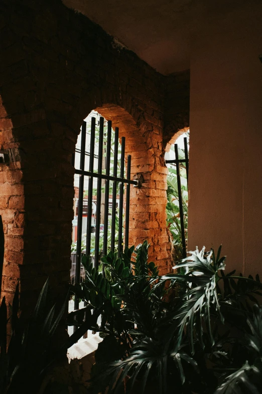 the room has several arches and a brick wall