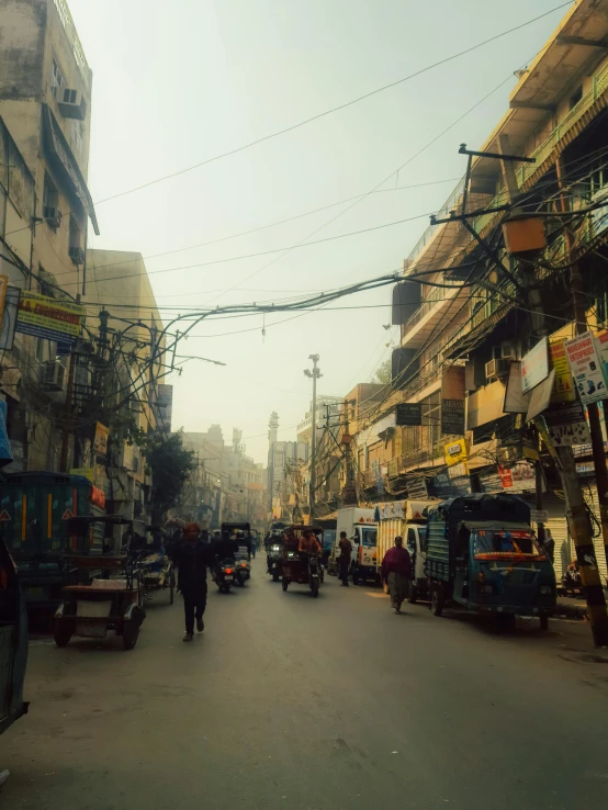 an image of people walking down the middle of a road