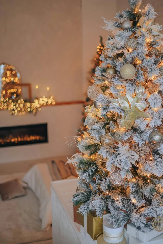 white christmas tree decorated with multicolored lights