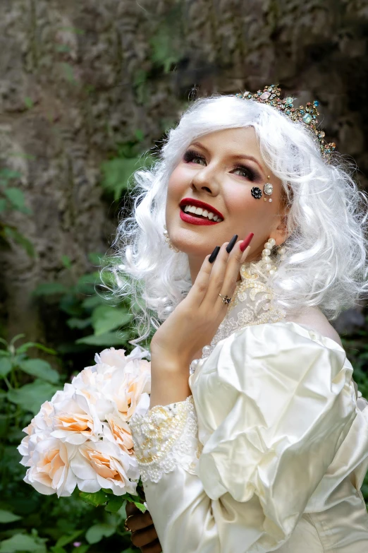 a woman dressed as a bride posing for a picture