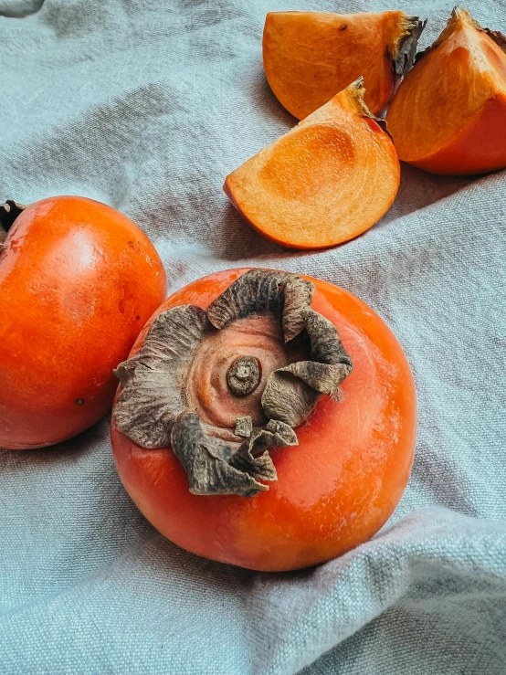 a rotten tomato sitting on top of a table