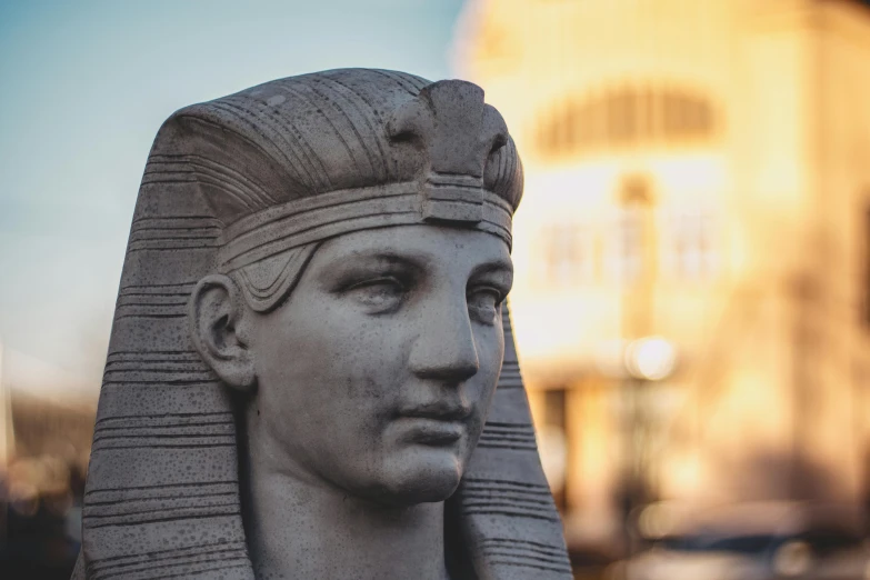 a statue of a man wearing an egyptian headdress