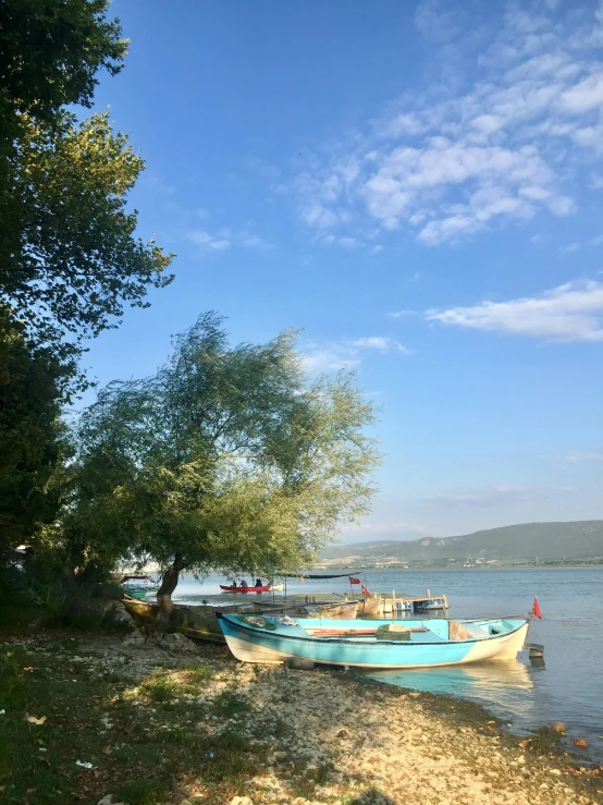 a couple of boats that are sitting in the water