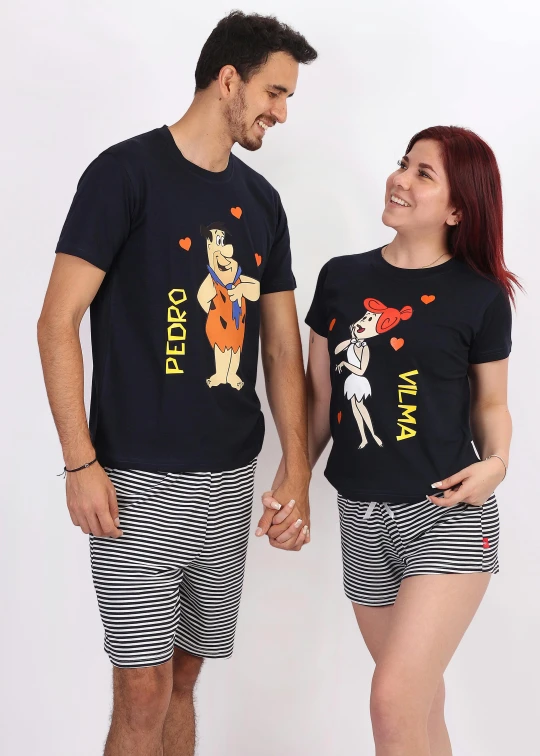 a couple wearing t - shirts standing and smiling