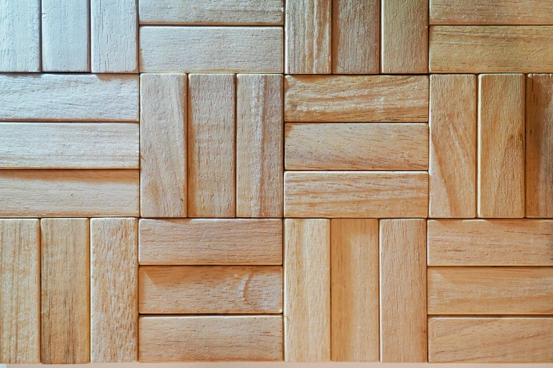 this wooden wall has several different designs on it