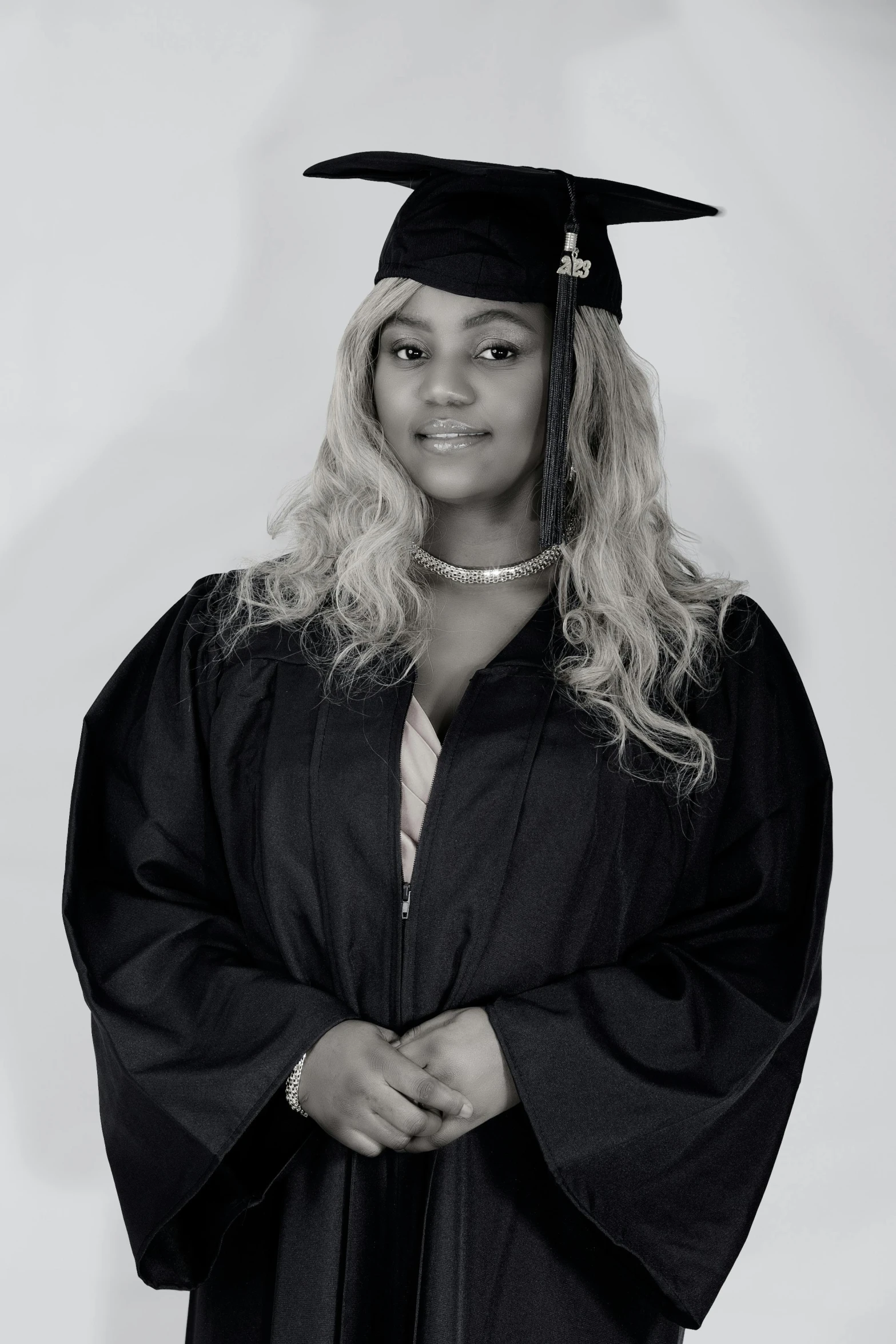 an african american student poses for a portrait