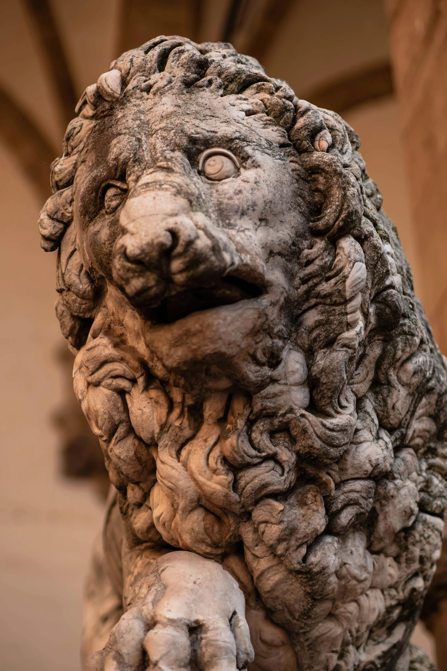 this statue is made of cement in a large room