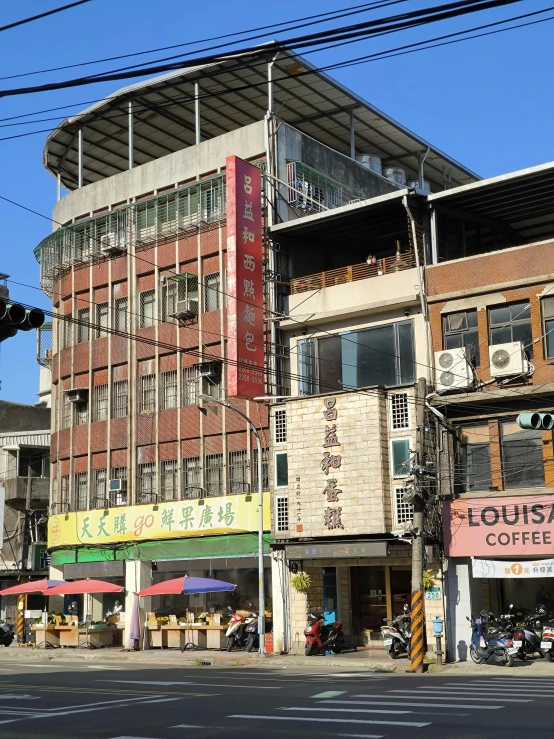 a building with a large sign for a coffee shop