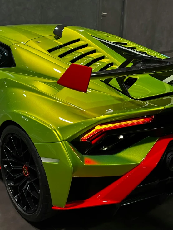 a bright green sports car on display