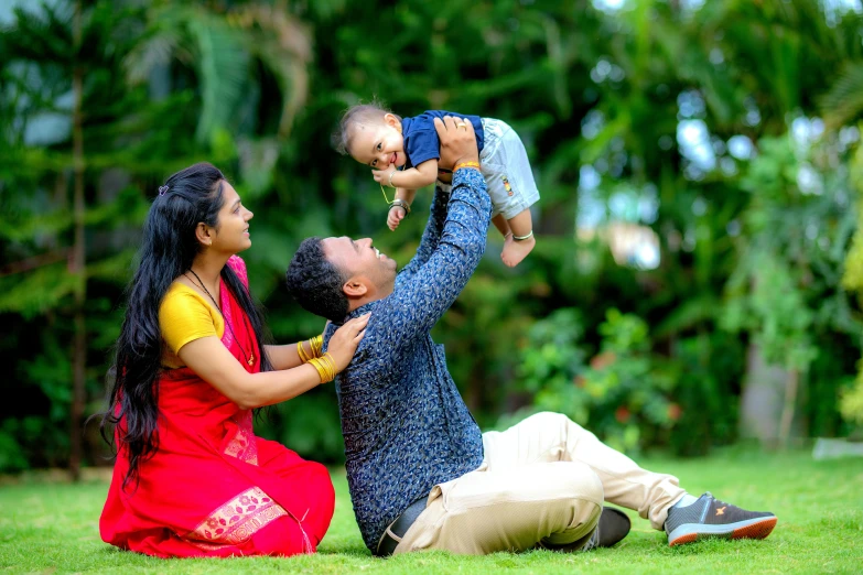 a family poses for their toddler's po