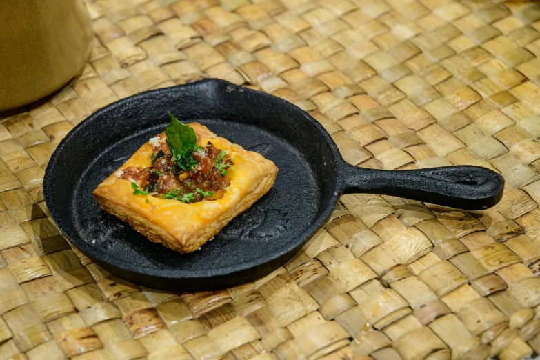 a close up of food in a pan on a table