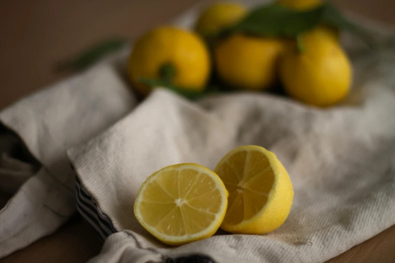 a yellow fruit that is cut in half