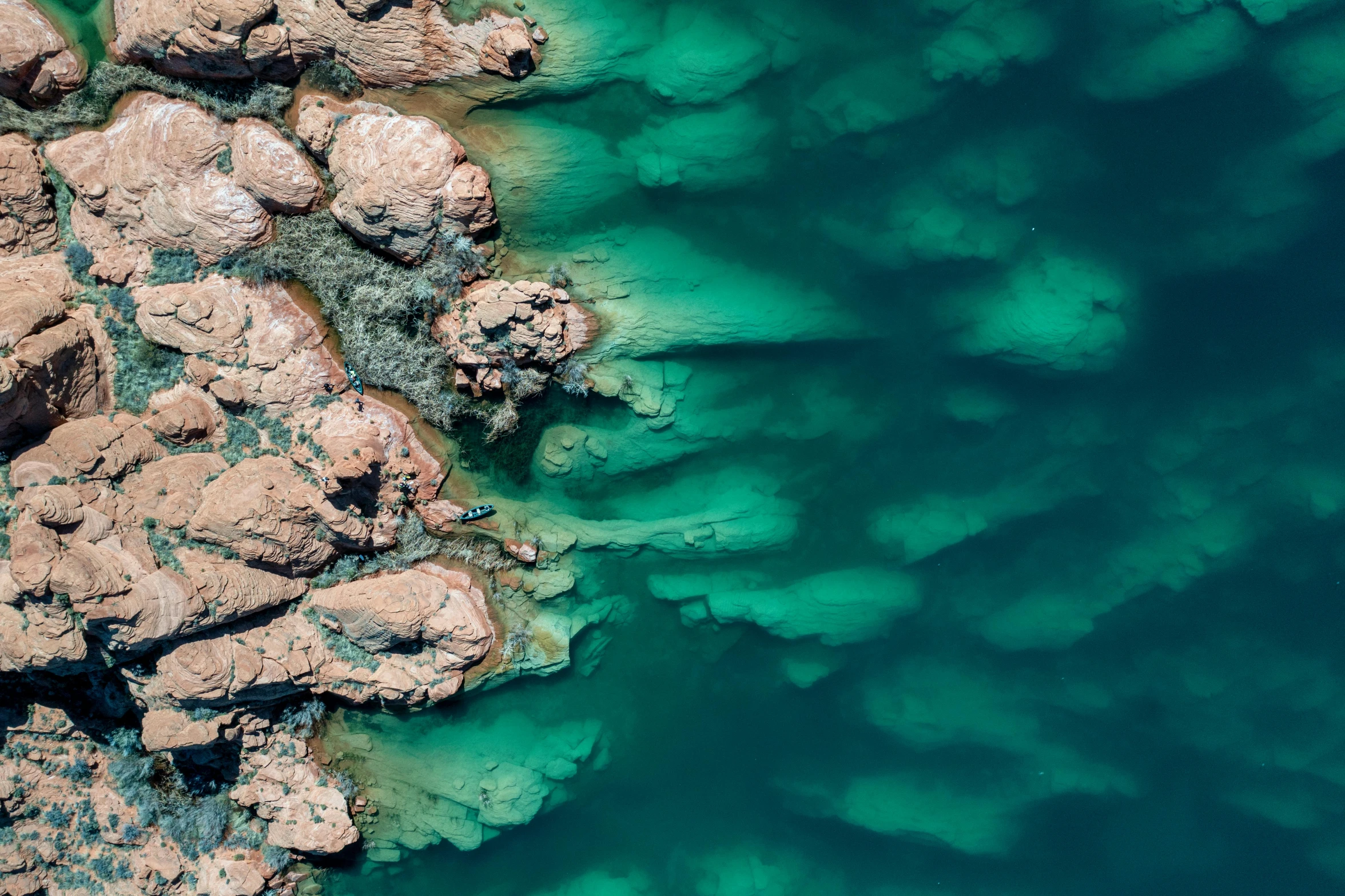 a large amount of water is surrounded by rocks