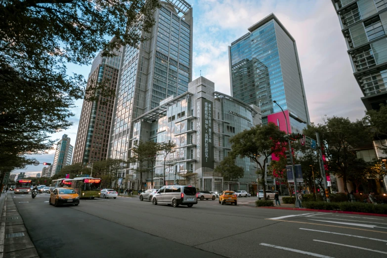 a group of buildings sit in the middle of a city street