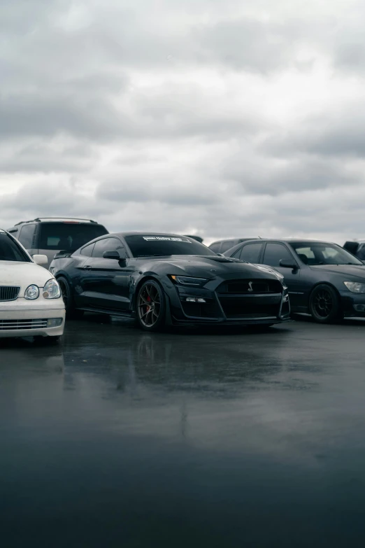 a group of cars are parked in a parking lot