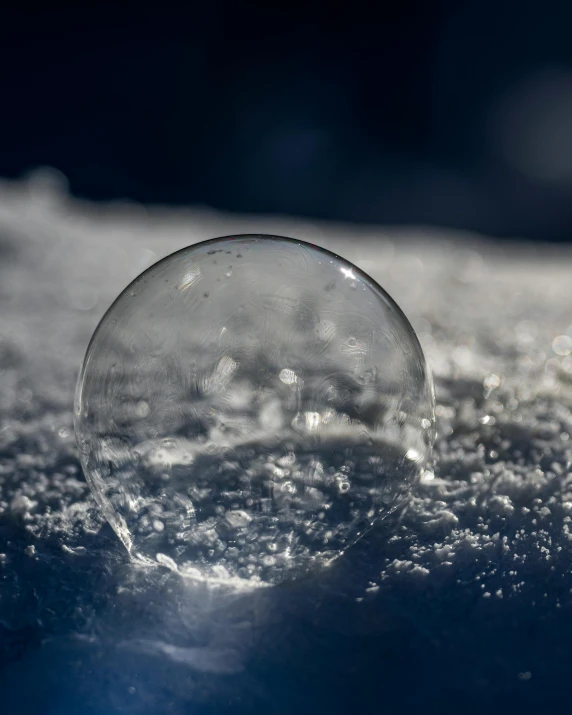 a snow globe that is in the air