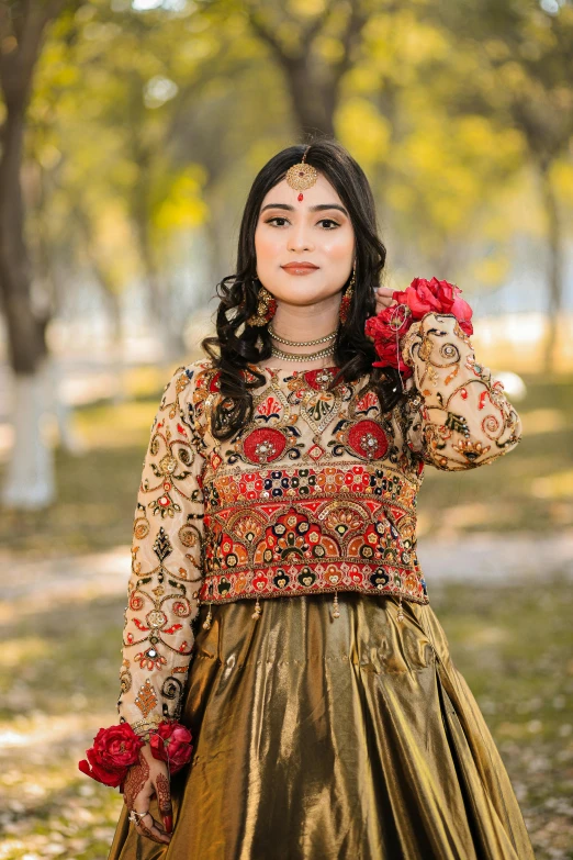 a woman in a dress that has flowers on it