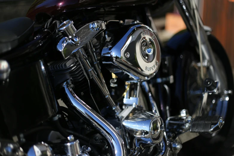 closeup of a chrome colored motor bike engine