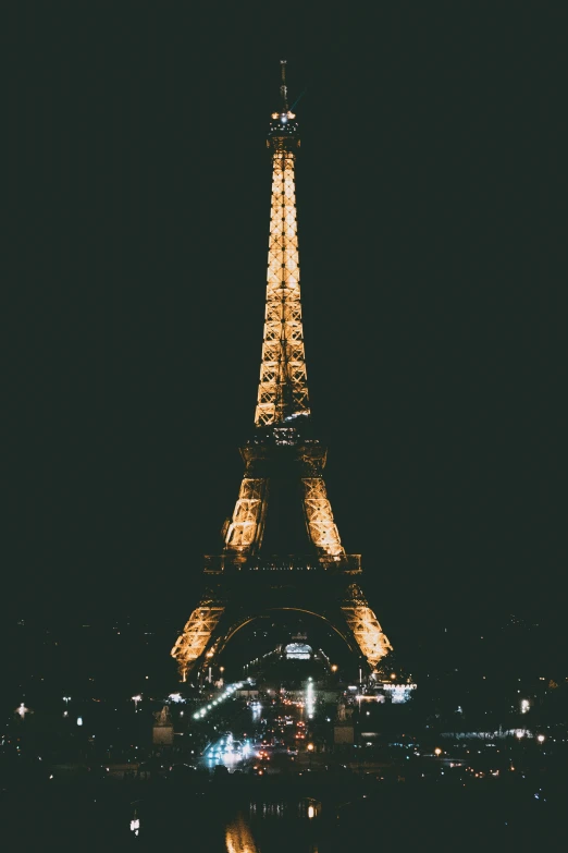 a picture taken at night of the eiffel tower in paris, france