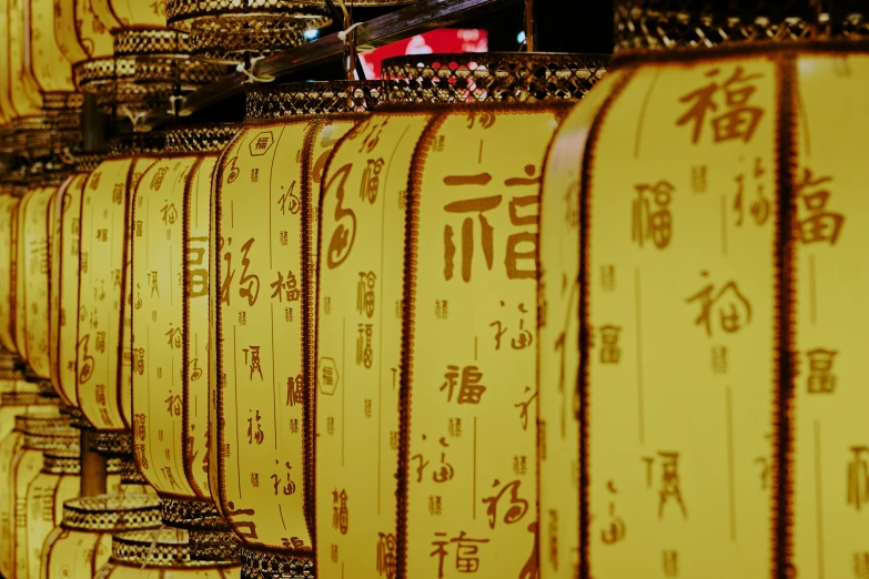 a bunch of containers hanging off the side of a wall