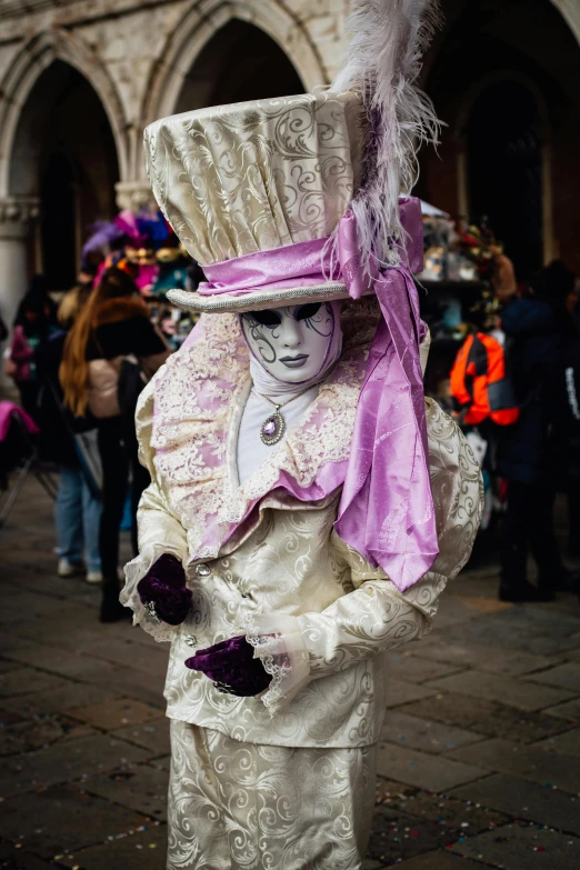 a masked costumed performer in a market is featured in a po