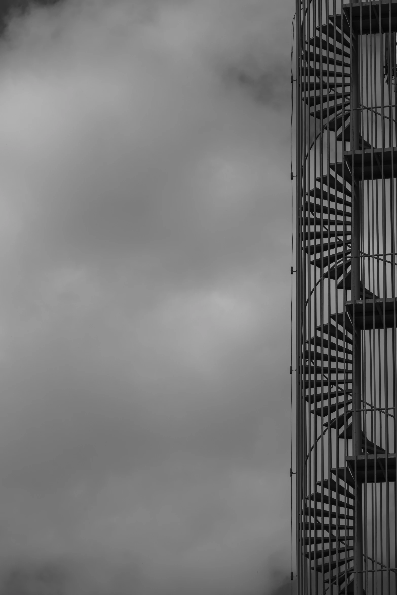 an airplane that is flying by some stairs