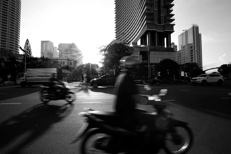 the people are on their bikes in the city