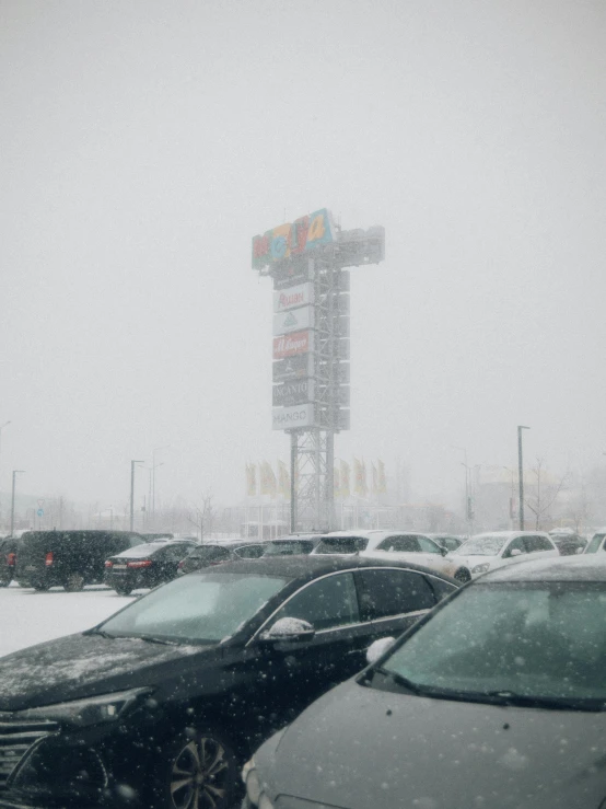 a parking lot in the winter with lots of snow