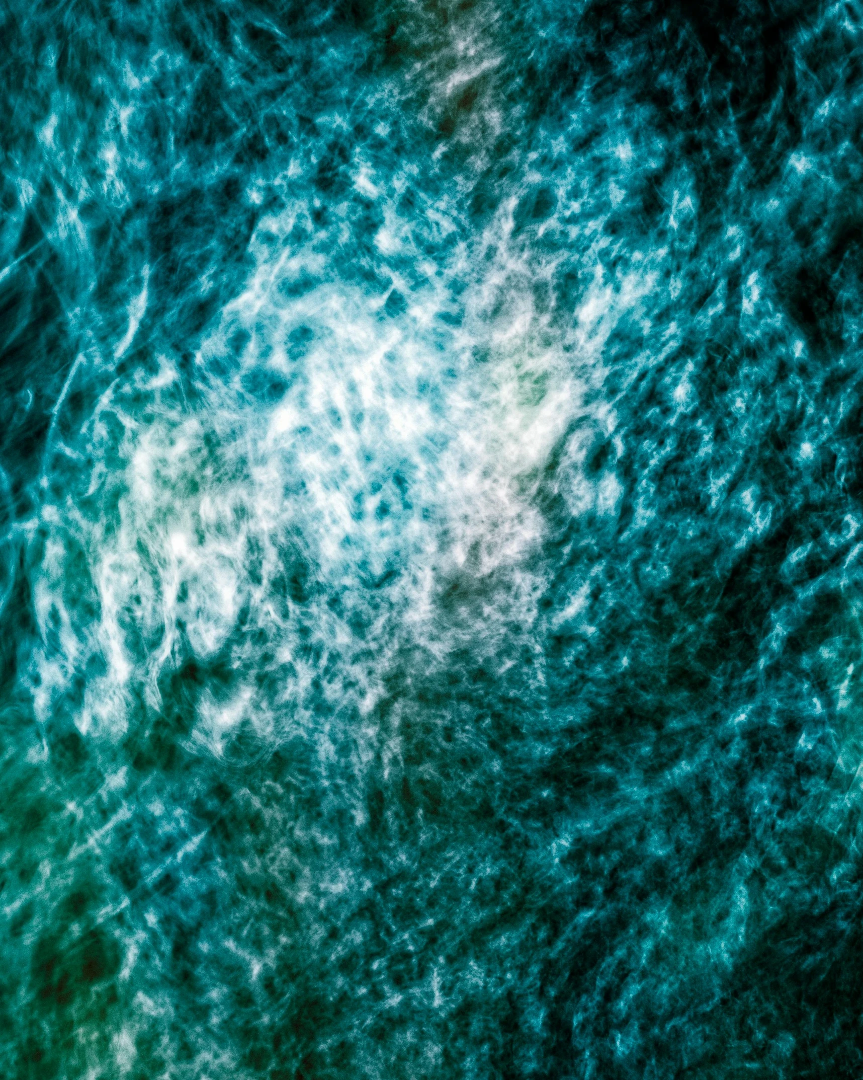 an image of some dark blue and green colors