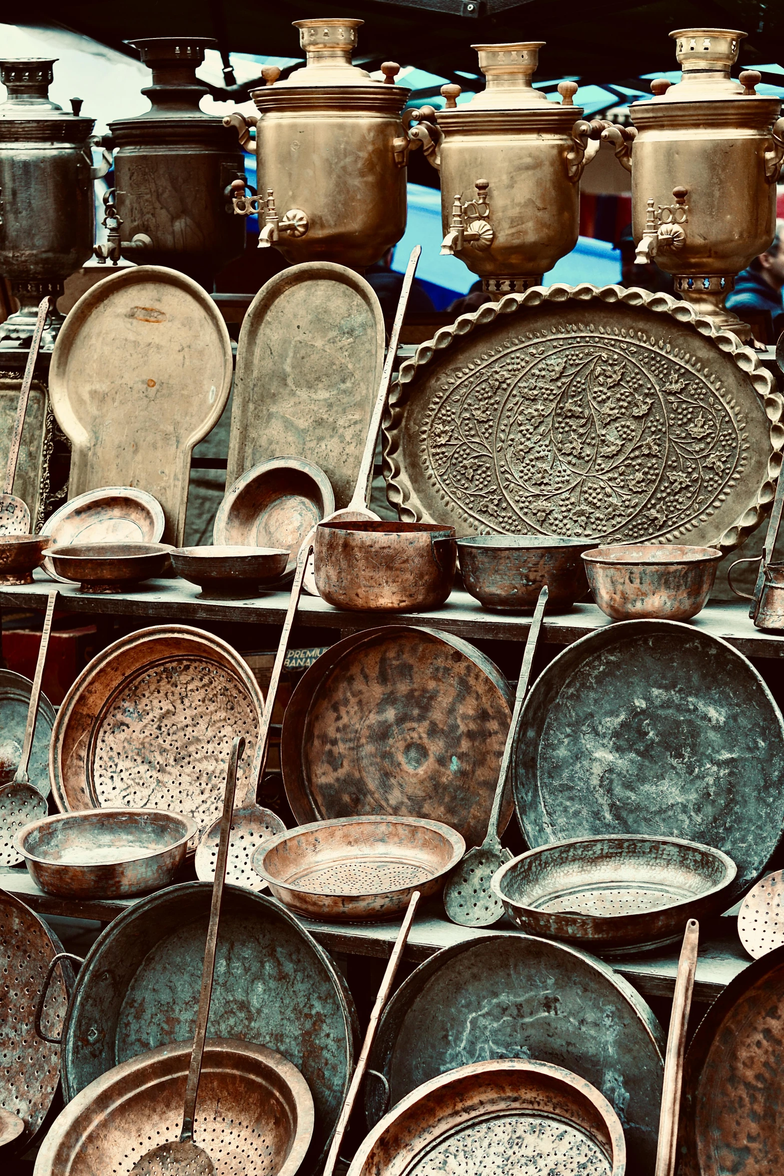 a variety of pans and cups with lids