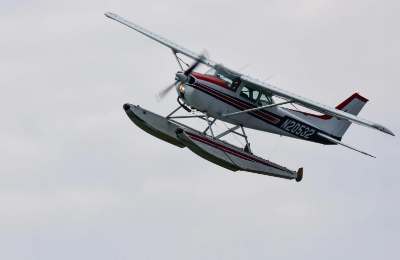 two planes flying side by side in the air