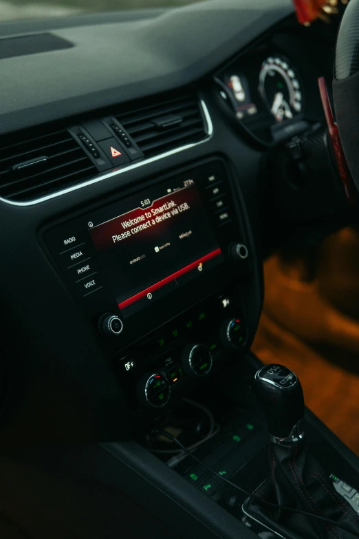 the dashboard of a small car with controls on