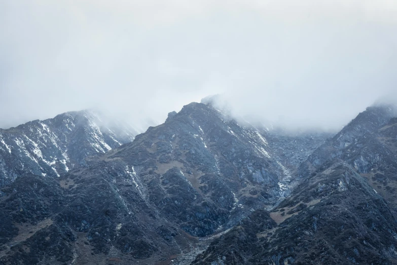 a very tall mountain that is covered in snow