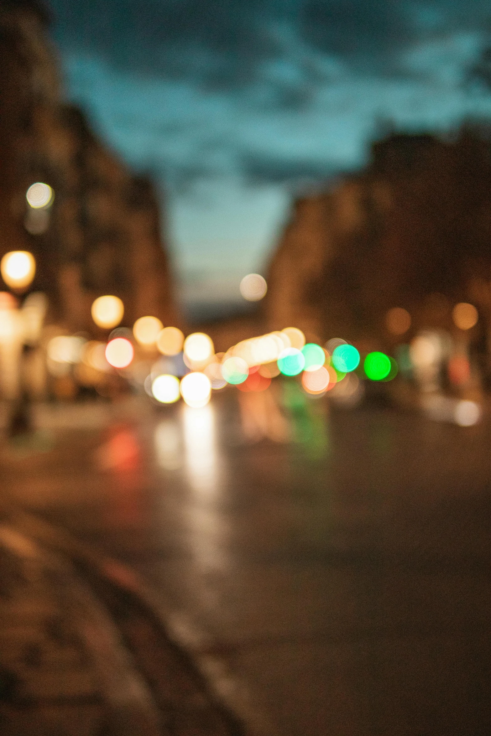 blurred po of cars in a road at night