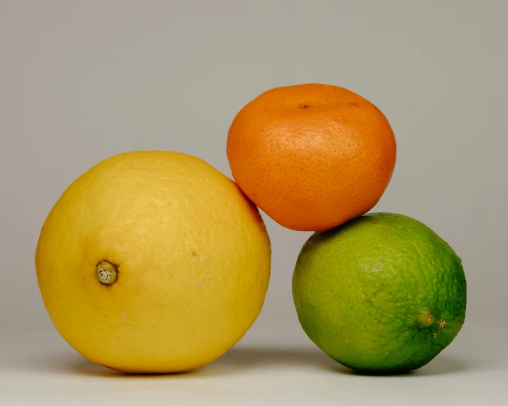 a group of different fruit sitting on top of each other