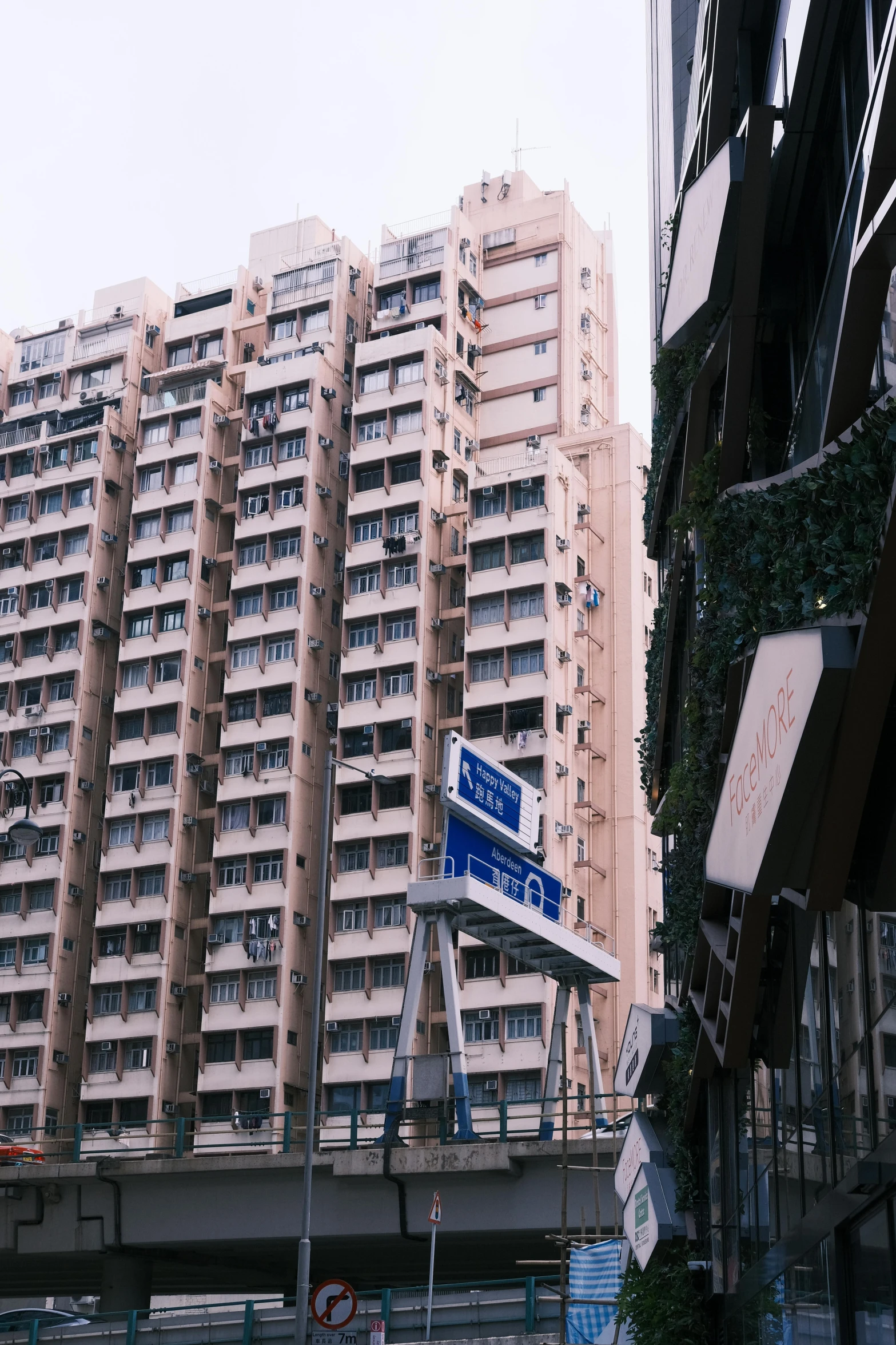 an apartment building on a street in front of another building