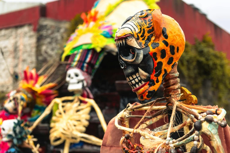 skeletons dressed in halloween costumes walking on street