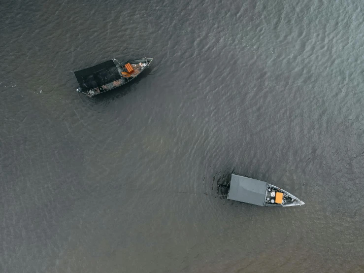 boats are floating out on the water and some are not