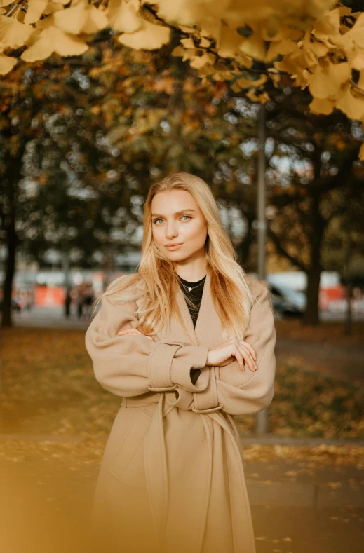 a girl standing in the park for a portrait